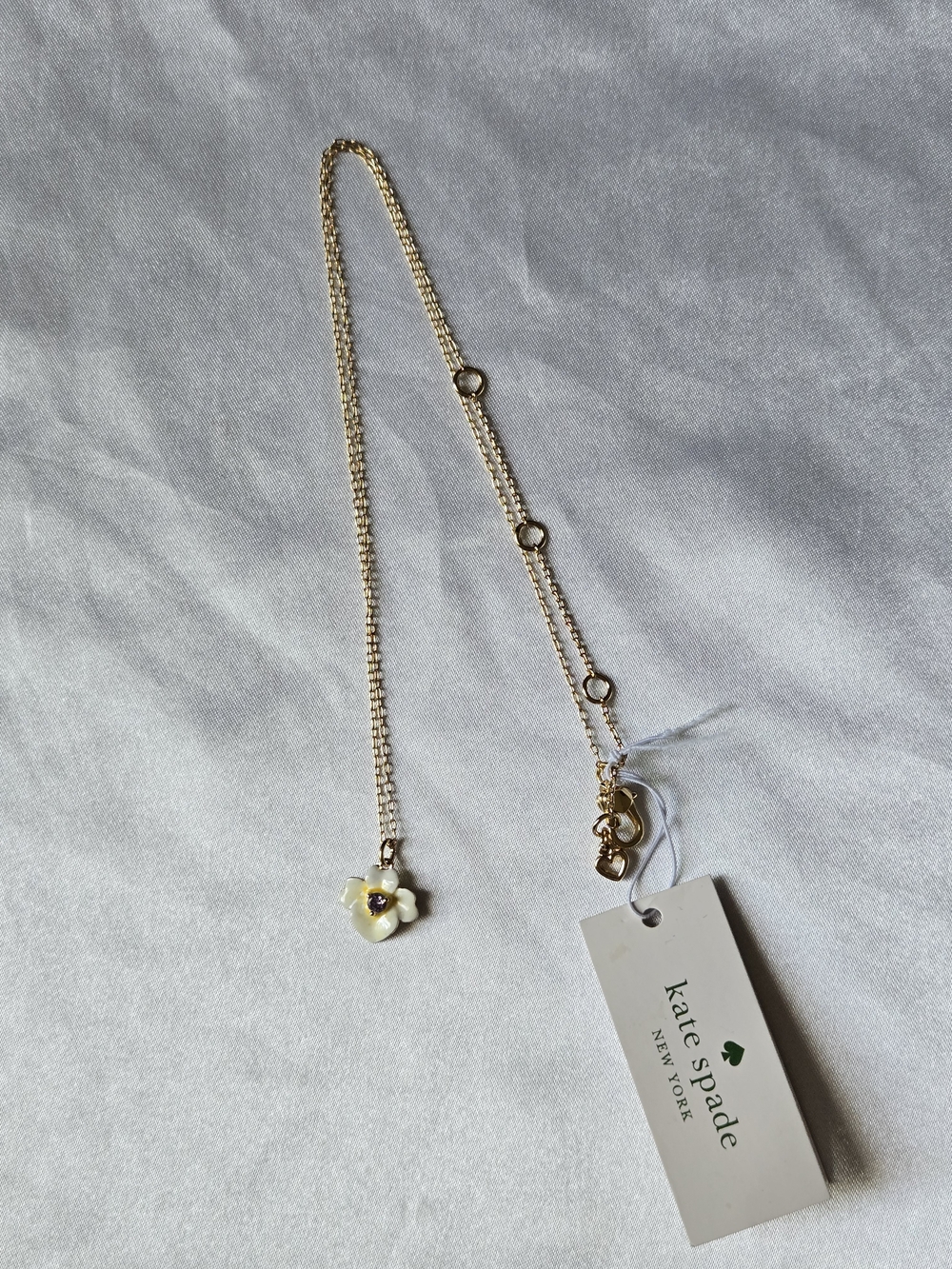 kate spade Gold-Tone Necklace with White and Yellow Flower Charm